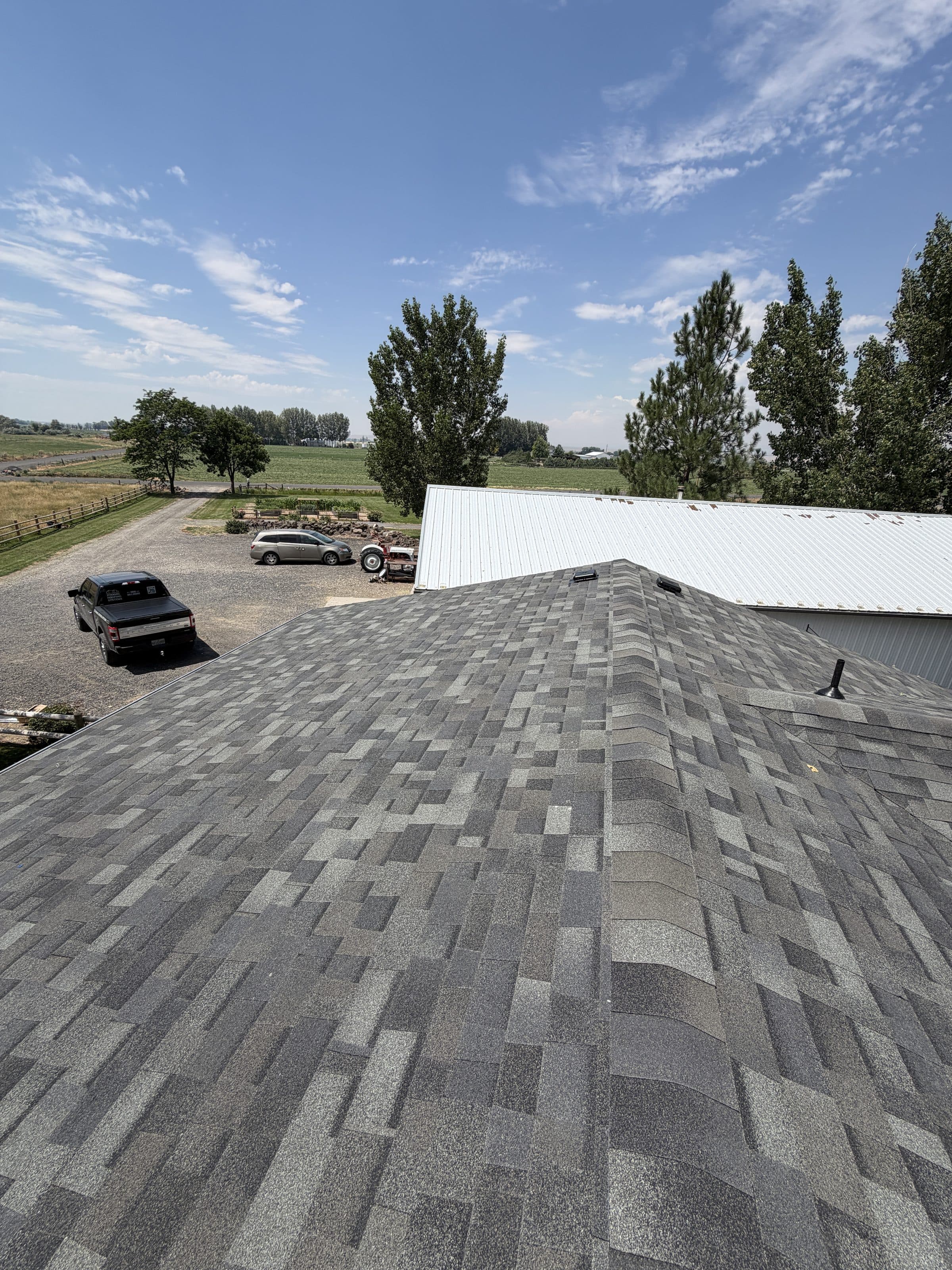 View from the roof ridge overlooking the property after a re-roof