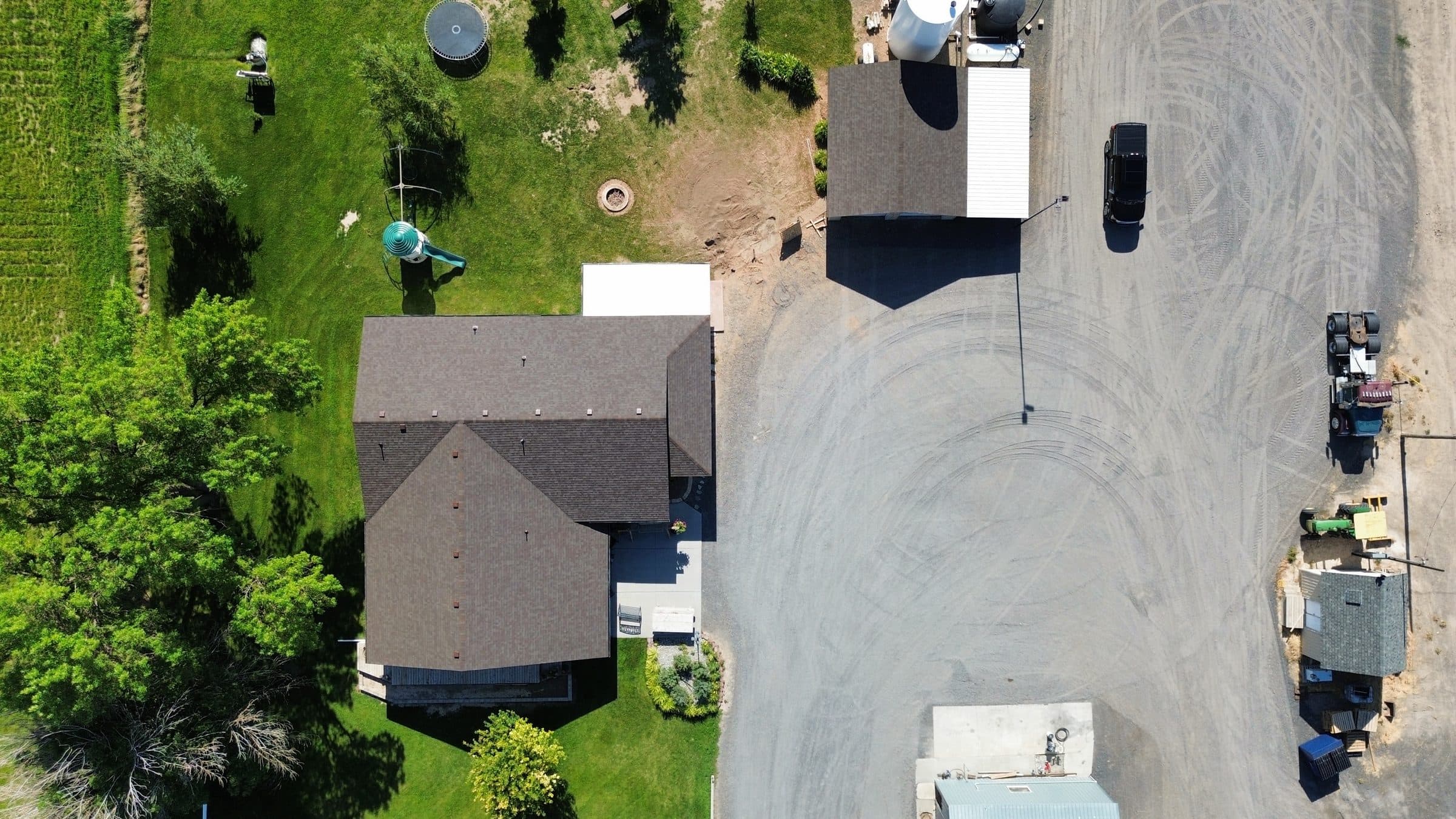 Aerial view of a finished roof on a rural Idaho property